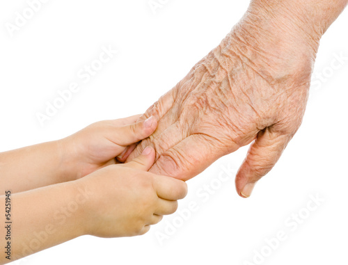 Photo: Senior and baby holding hands. isolated on white Senior and baby holding hands. isolated on white