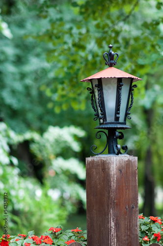 Photo: Garden lantern of an old wooden beam Garden lantern of an old wooden beam