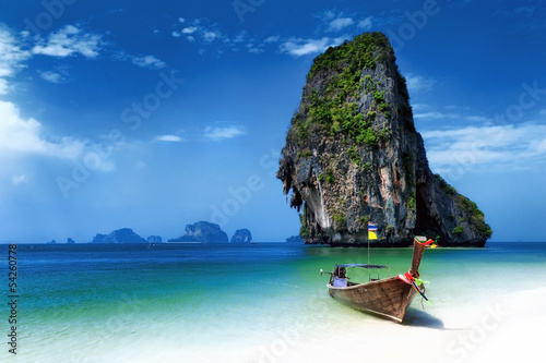  Thailand beach in tropical island. Travel boats at summer in sea