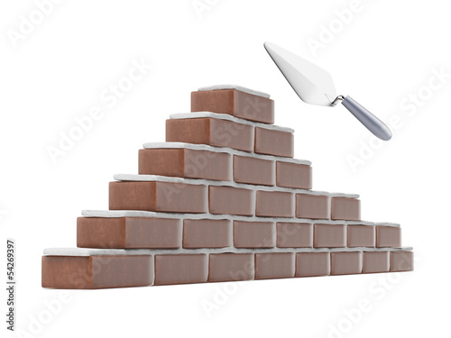 Illustration: Trowel and brick wall Trowel and brick wall