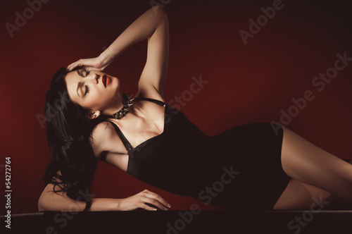Photo: woman in a dark dress woman in a dark dress