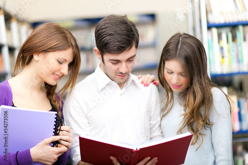 Photo: Students studying in a library Students studying in a library