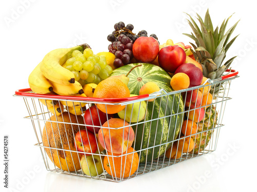 Photo: Assortment of exotic fruits in metal basket isolated on white Assortment of exotic fruits in metal basket isolated on white