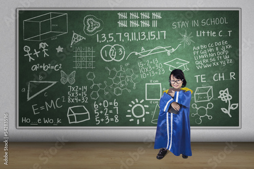 Photo: Asian girl graduate holding book in class Asian girl graduate holding book in class