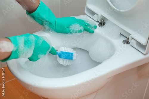 Photo: Toilet scrubbing Toilet scrubbing