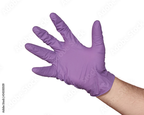 Photo: blue latex glove isolated blue latex glove isolated