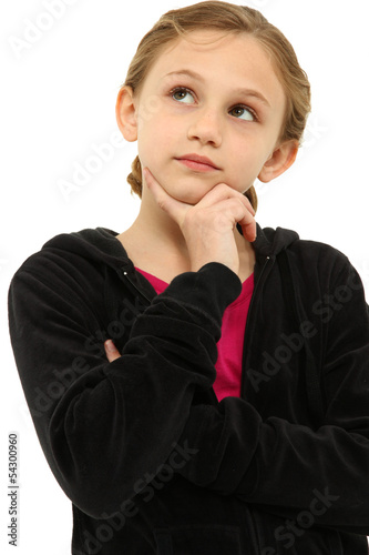 Photo: Adorable Caucasian Tween Girl Child Thinking Seriously over Whit Adorable Caucasian Tween Girl Child Thinking Seriously over Whit