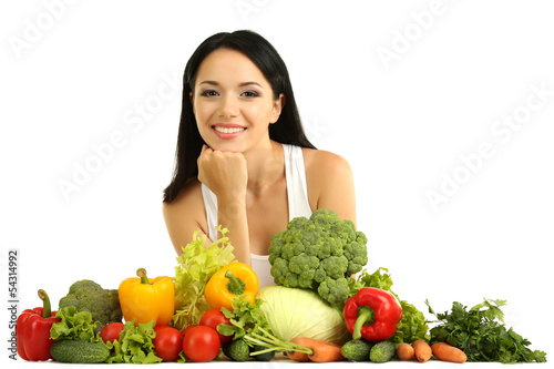 Photo: Girl with vegetables isolated on white Girl with vegetables isolated on white