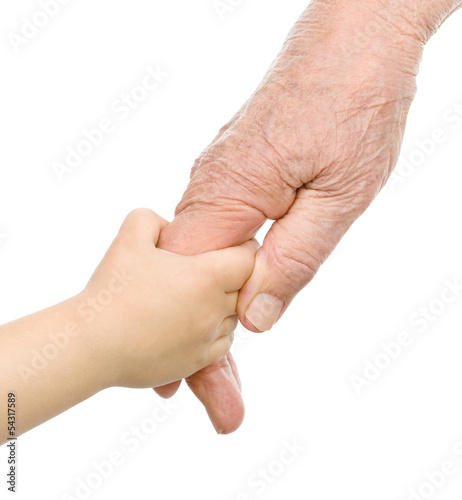 Photo: old man and a kid holding hands together. isolated on white back old man and a kid holding hands together. isolated on white back