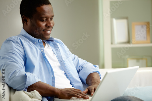 Photo: Using laptop Using laptop