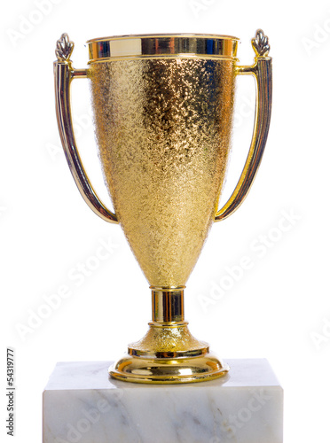 Photo: Gold trophy on a marble base with white background Gold trophy on a marble base with white background