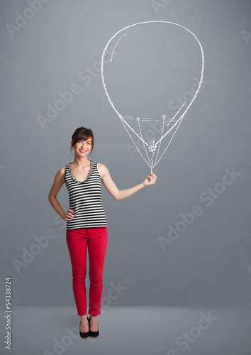 Photo: Beautiful woman holding balloon drawing Beautiful woman holding balloon drawing