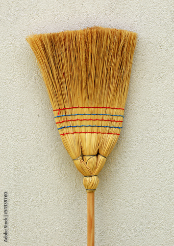 Photo: Whisk broom standing at wall Whisk broom standing at wall