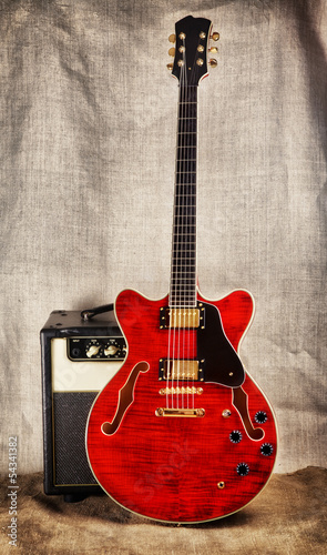 Photo: Semi-Hollow Guitar and Amplifier Semi-Hollow Guitar and Amplifier