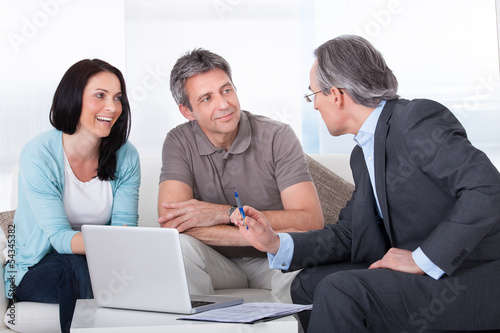 Photo: Couple Meeting Consultant Couple Meeting Consultant