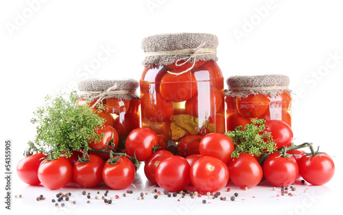 Photo: Tasty canned and fresh tomatoes, isolated on white Tasty canned and fresh tomatoes, isolated on white