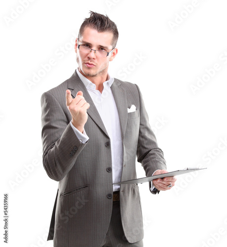 Photo: Portrait of a smiling man pointing his finger on the copyspace Portrait of a smiling man pointing his finger on the copyspace