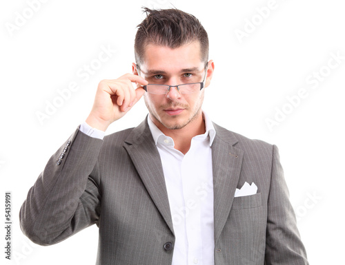 Photo: Young handsome man in black suit and glasses smiling Young handsome man in black suit and glasses smiling