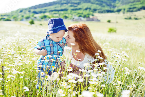 Photo: family having fun in field family having fun in field