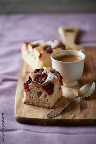 Photo: Homemade raspberry cake and a cup of coffee Homemade raspberry cake and a cup of coffee