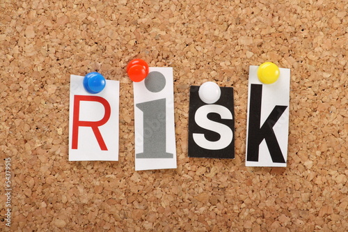 Photo: The word Risk on a cork notice board The word Risk on a cork notice board
