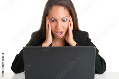 Photo: Woman in Panic Looking At A Computer Monitor Woman in Panic Looking At A Computer Monitor