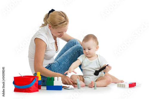 Photo: baby boy and mother playing together with construction set toy baby boy and mother playing together with construction set toy