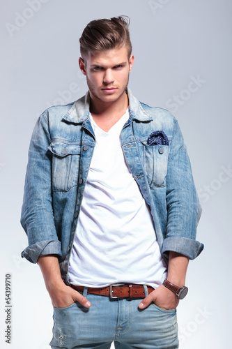 Photo: cute young man with hands in pockets cute young man with hands in pockets