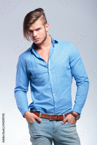 Photo: casual young man looks at you casual young man looks at you