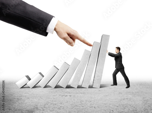 Photo: man holding column man holding column