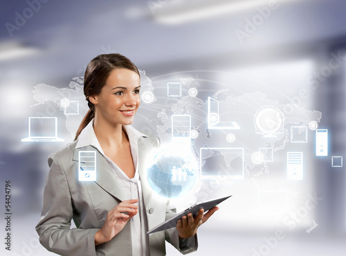 Photo: Businesswoman with tablet pc Businesswoman with tablet pc