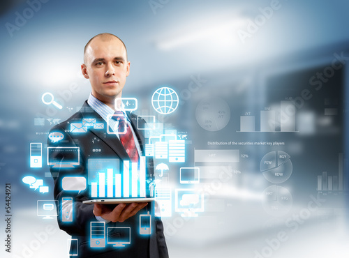 Photo: Businessman with tablet pc Businessman with tablet pc