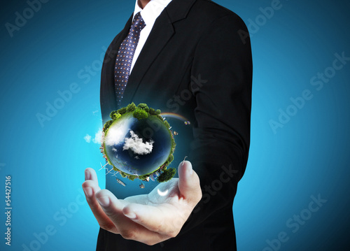Photo: earth globe in his hands earth globe in his hands
