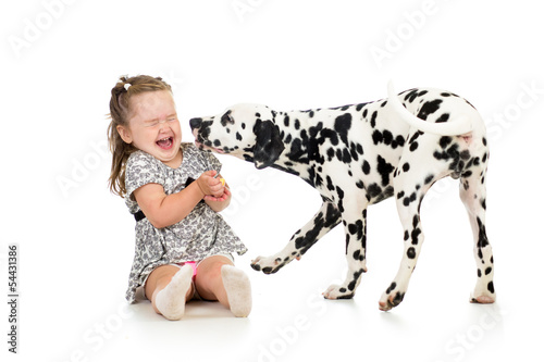Photo: child girl playing with dog child girl playing with dog