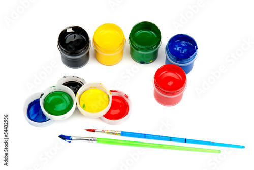 Photo: watercolor paints and brushes isolated on white background watercolor paints and brushes isolated on white background