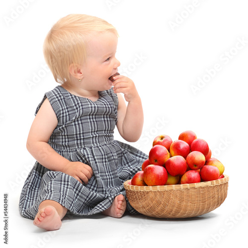Photo: Farmer girl and red apples. Farmer girl and red apples.