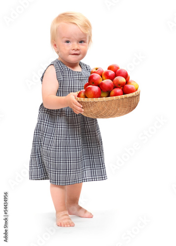 Photo: Farmer girl and red apples. Farmer girl and red apples.