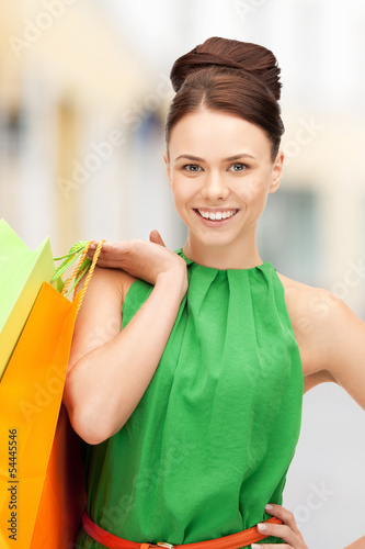 Photo: woman with shopping bags in ctiy woman with shopping bags in ctiy