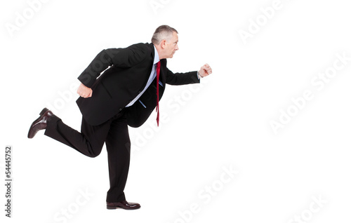 Photo: Businessman running isolated on white Businessman running isolated on white