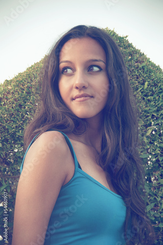 Photo: Portrait of sensual young woman looking aside Portrait of sensual young woman looking aside