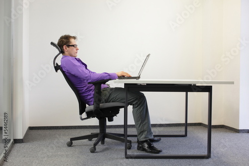 Photo: relaxed position at laptop relaxed position at laptop
