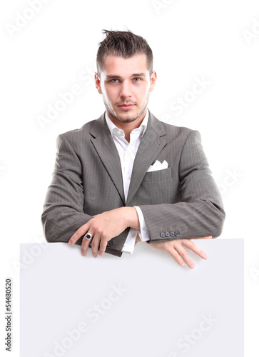 Photo: Happy business man presenting with copy space for your text Happy business man presenting with copy space for your text