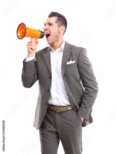 Photo: Business man shouting through megaphone Business man shouting through megaphone