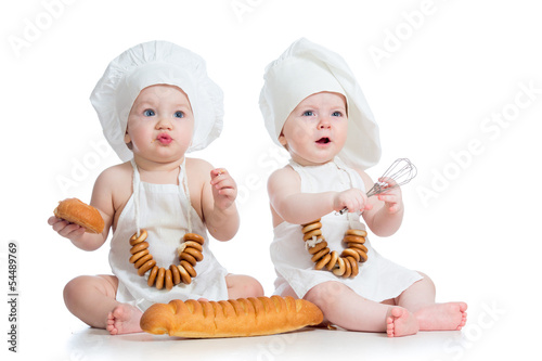 Photo: funny cooks children boy and girl funny cooks children boy and girl