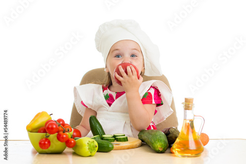 Photo: Chef kid preparing healthy food Chef kid preparing healthy food