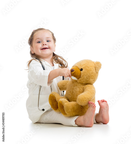 Photo: kid girl playing doctor with toy kid girl playing doctor with toy