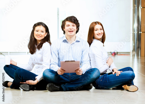 Photo: Three students smiling Three students smiling