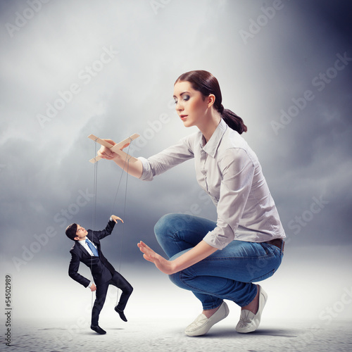 Photo: Businesswoman puppeteer Businesswoman puppeteer