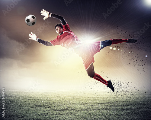 Photo: Goalkeeper catches the ball Goalkeeper catches the ball