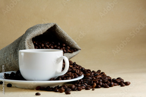 Photo: Cup from coffee on coffee grains Cup from coffee on coffee grains